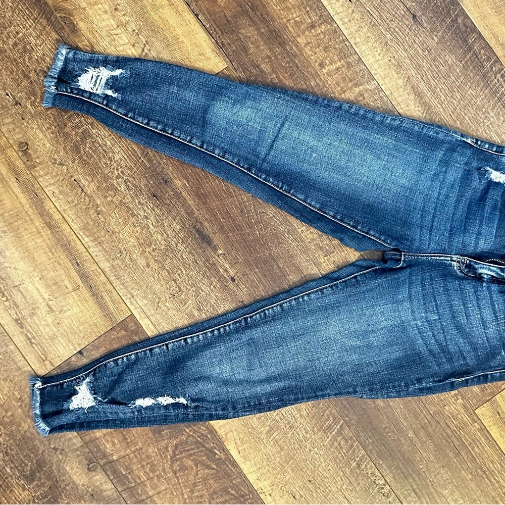 Distressed Blue Jeans